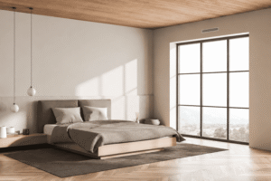 Chambre lumineuse rafraîchie par une climatisation gainable en période de canicule