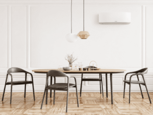 Climatisation réversible split mural dans un séjour, installation éligible à la TVA à 5,5 % et à la prime CEE en 2026
