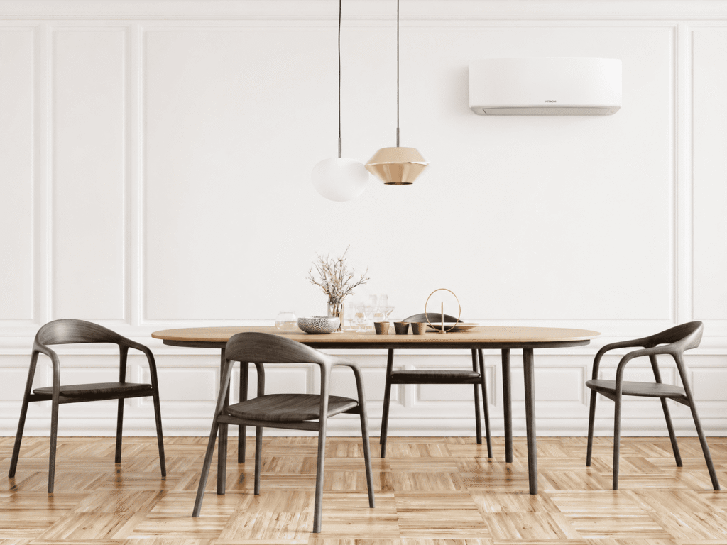 Salle à manger avec climatisation réversible split mural, exemple de monosplit installé dans une pièce de vie