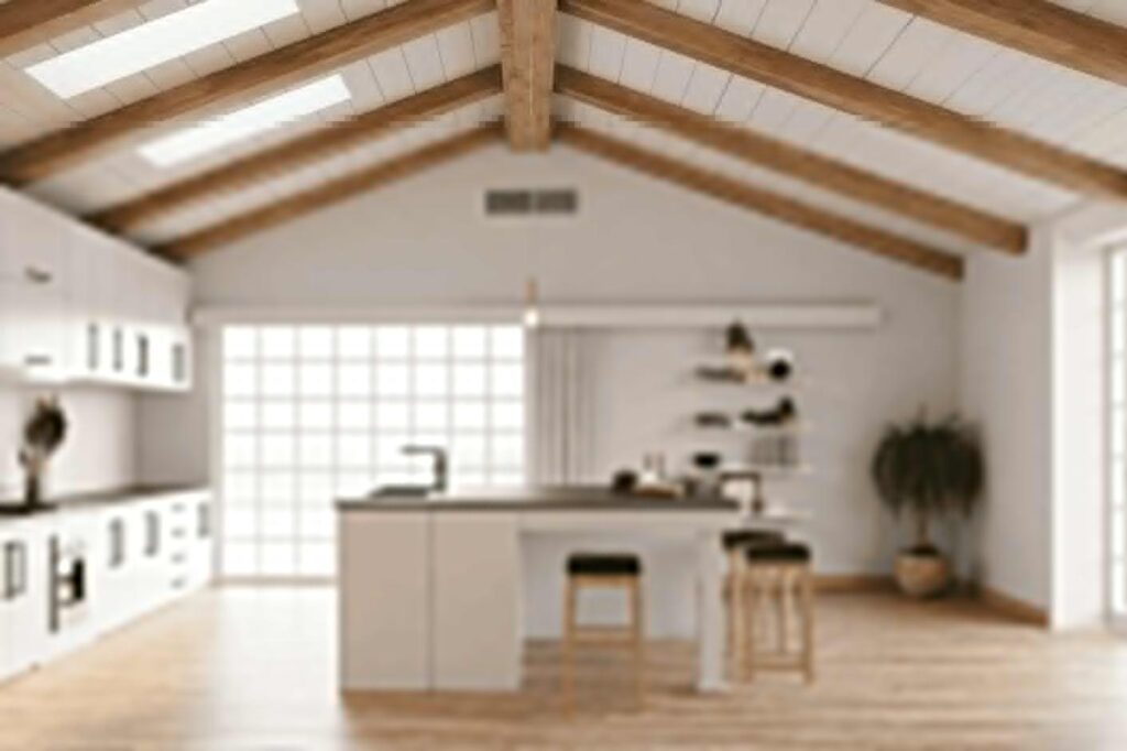 Cuisine ouverte avec grille de soufflage au plafond d’une climatisation gainable, alternative invisible au multisplit